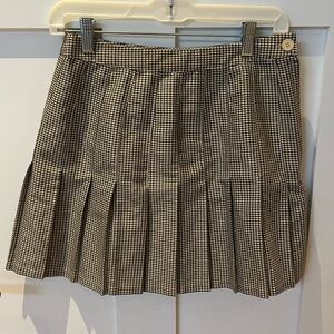 Urban Outfitters Pleated mini skirt. Size small. Tan and brown color